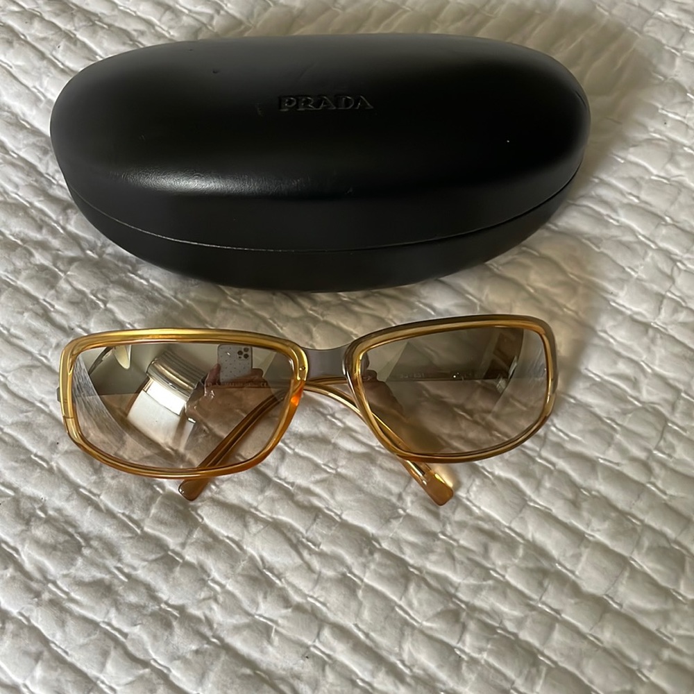 Prada sunglasses with case Mirror lens.  Lightly tinted